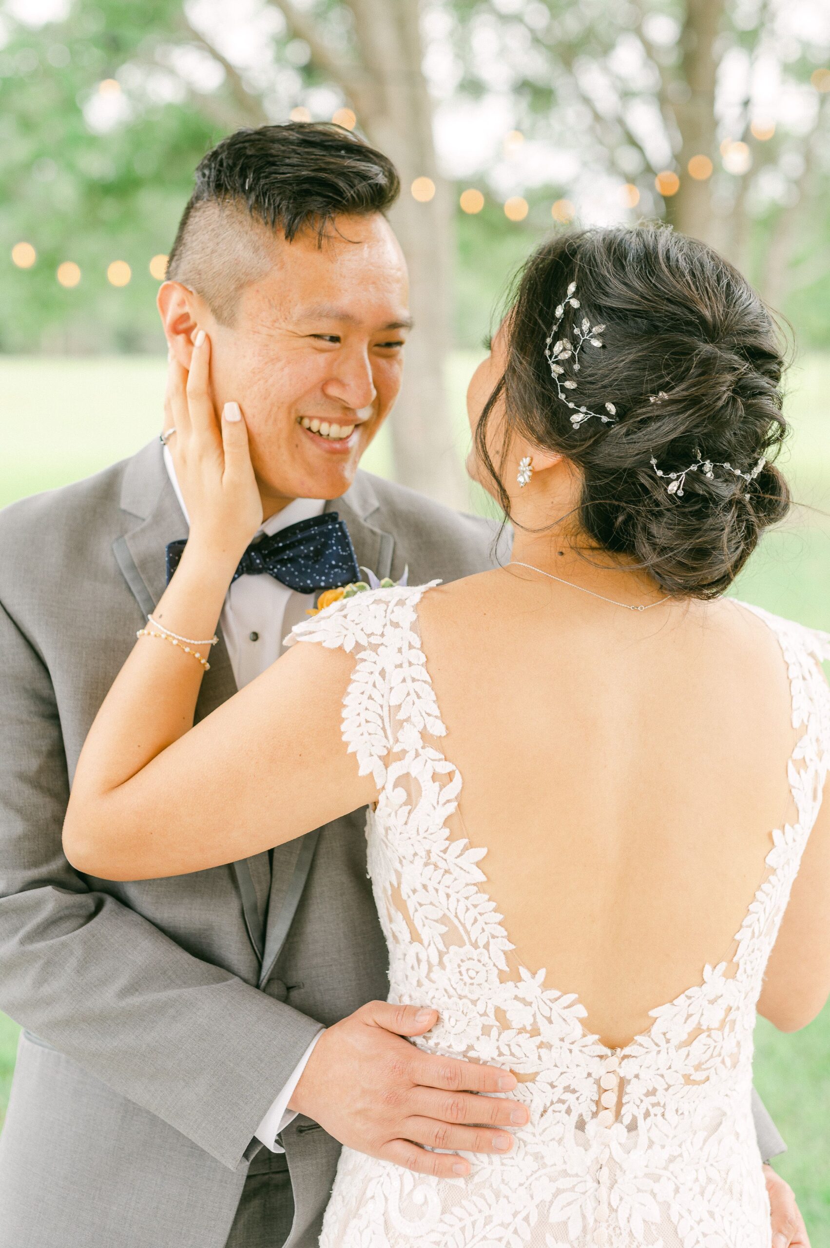 bride and groom cuddling at their wedding in Santa Fe, Texas