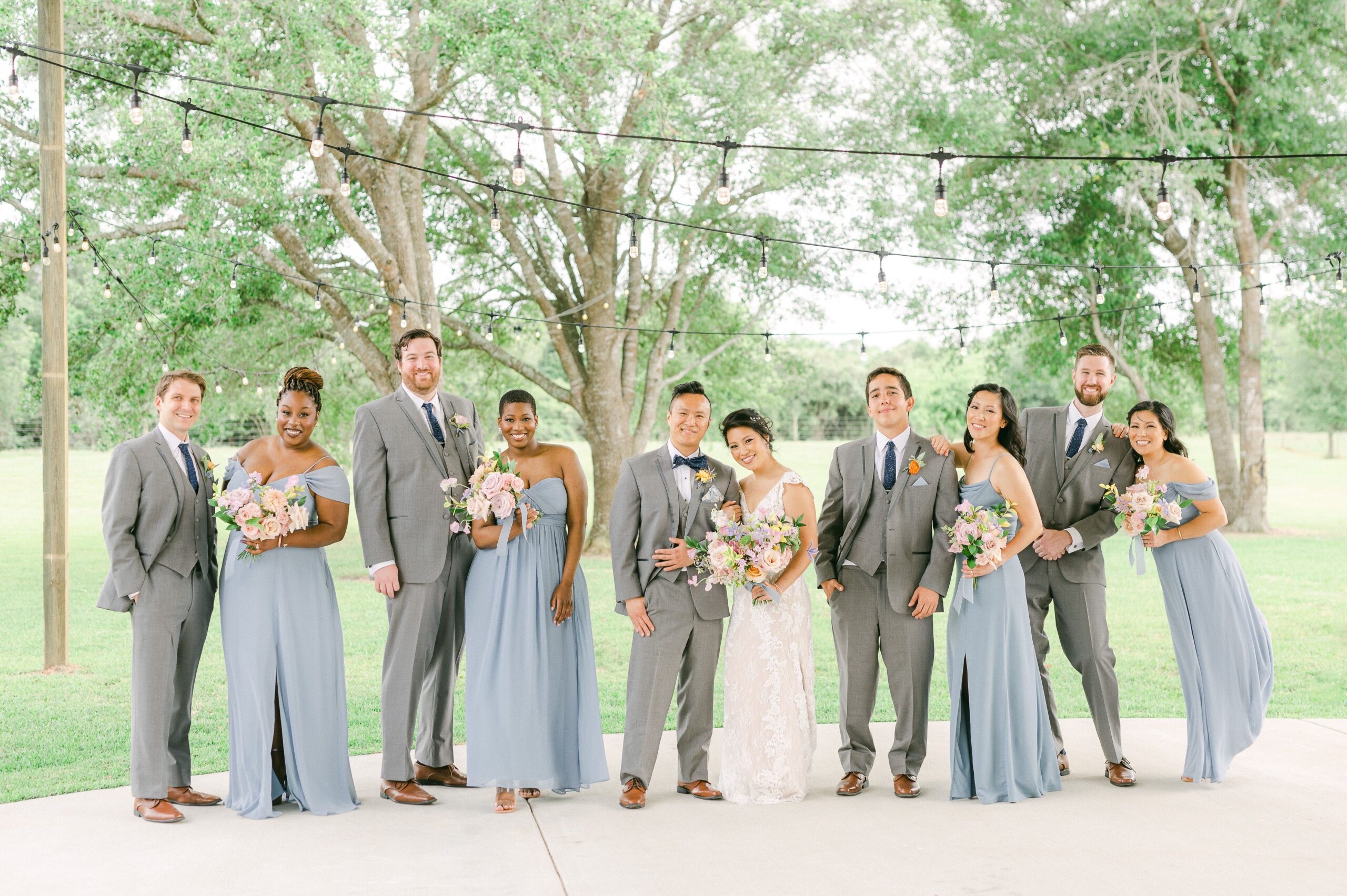 wedding party outside Willowynn Barn for spring wedding