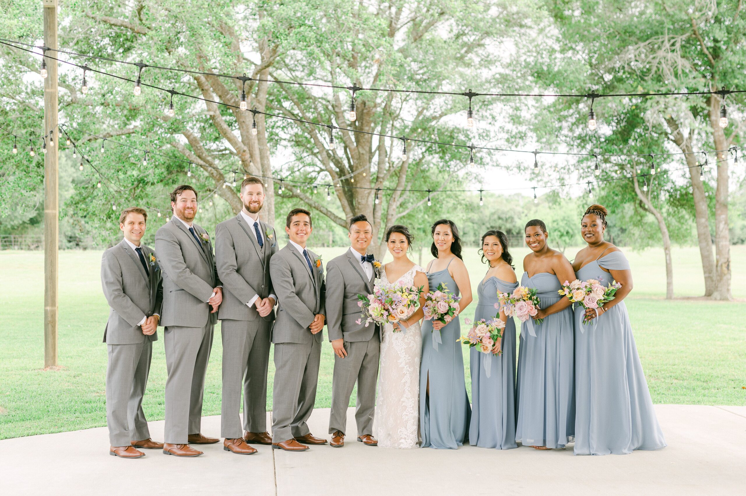 wedding party outside Willowynn Barn for spring wedding