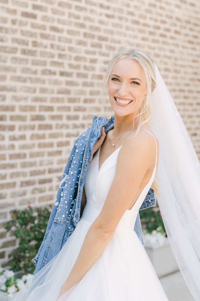 bride with personalized jean jacket