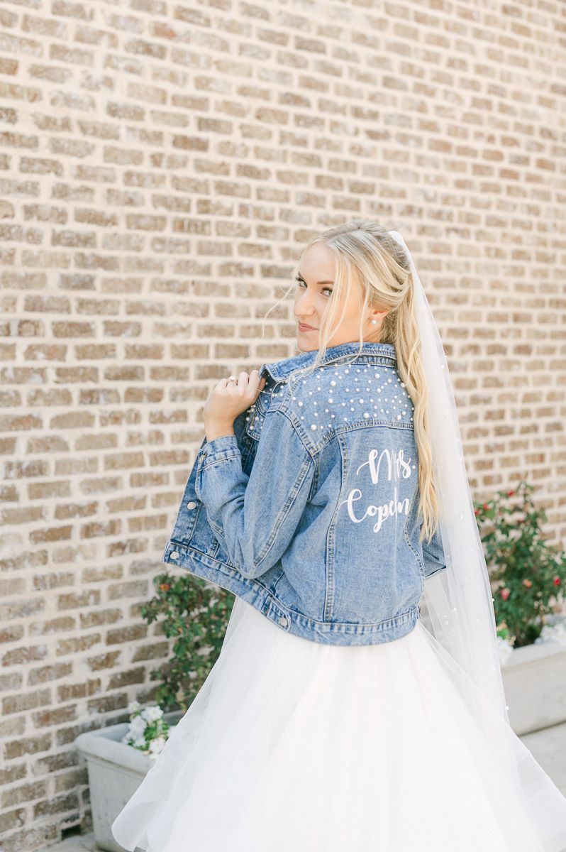 bride with personalized jean jacket