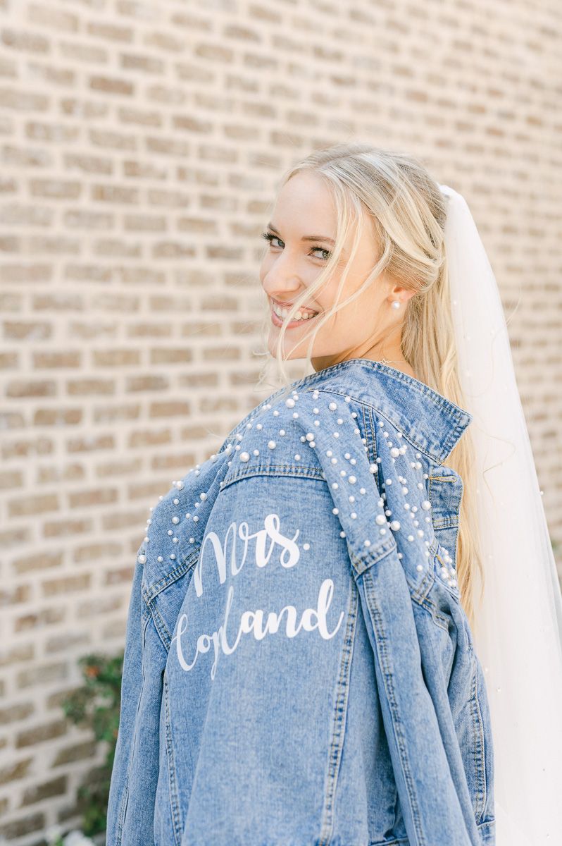 bride with personalized jean jacket