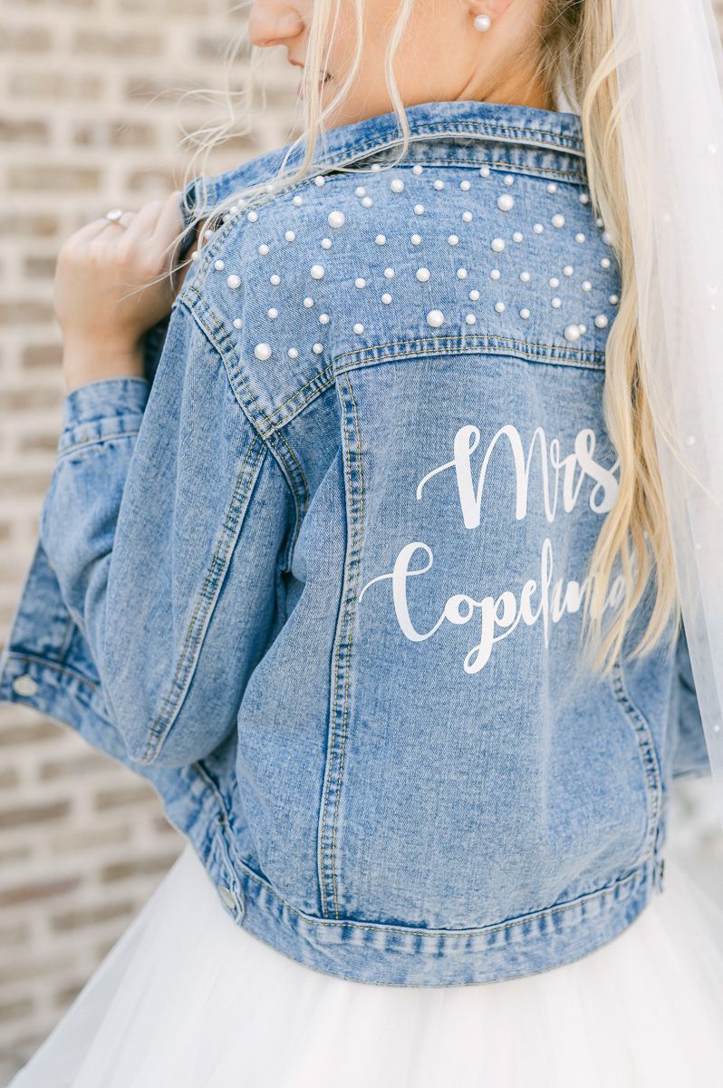 bride with personalized jean jacket
