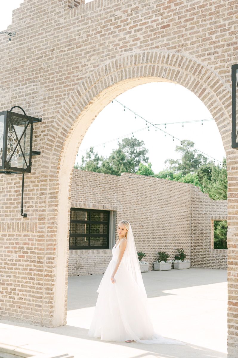 bride outside Iron Manor in Montgomery, Tx