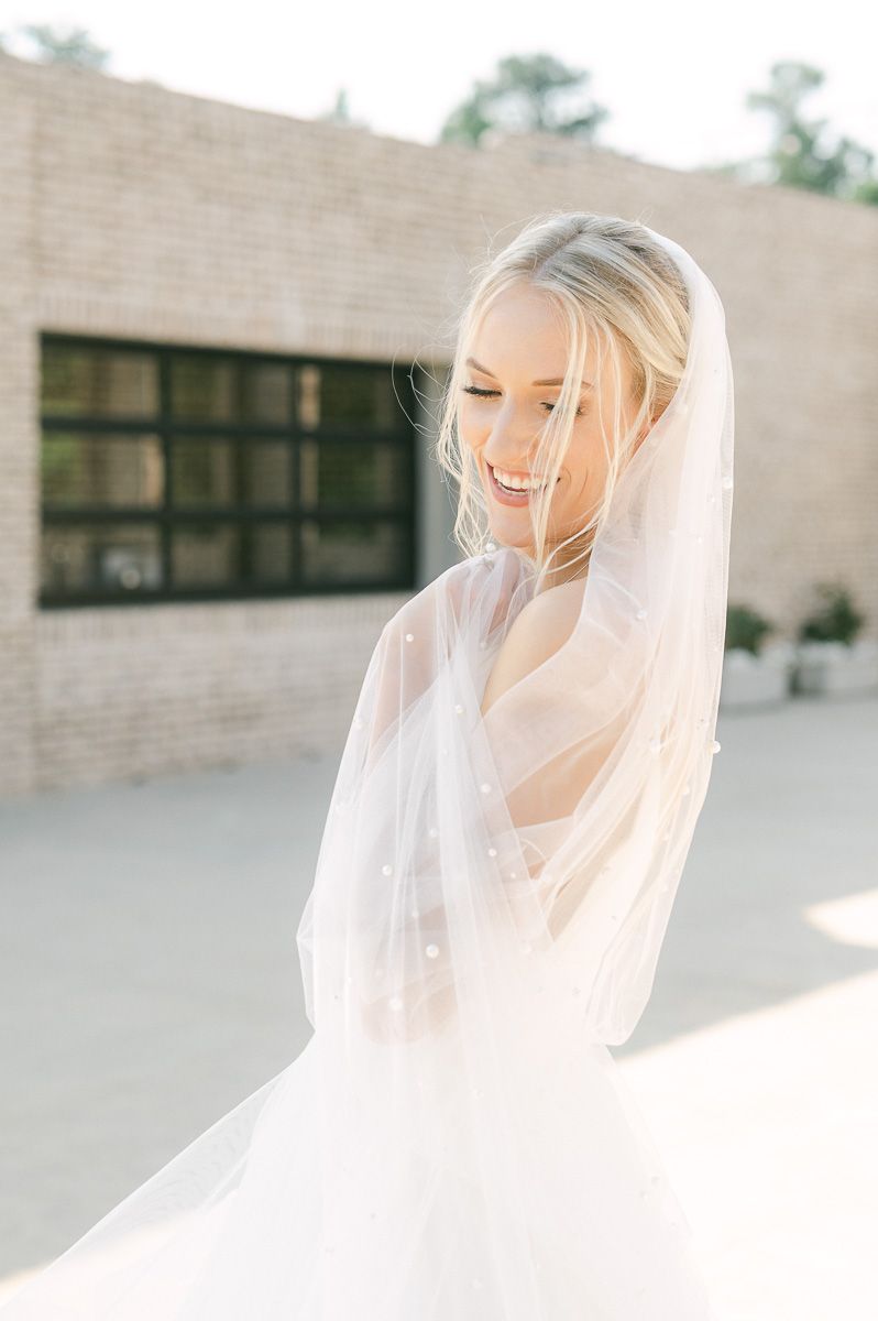 bride outside Iron Manor in Montgomery, Tx