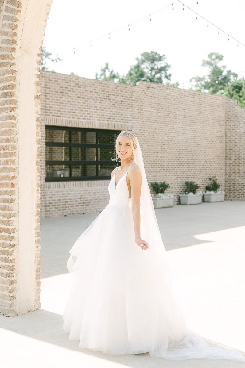bride outside Iron Manor in Montgomery, Tx