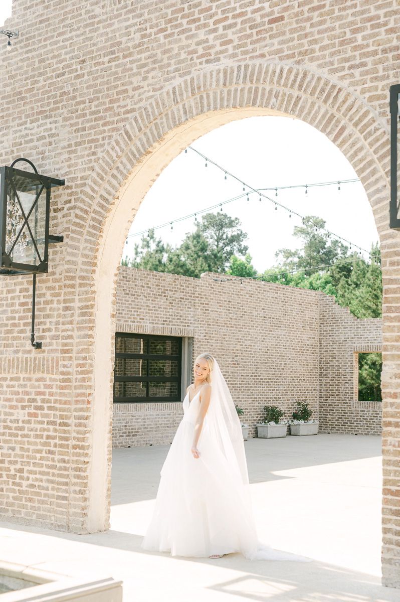 bride outside Iron Manor in Montgomery, Tx