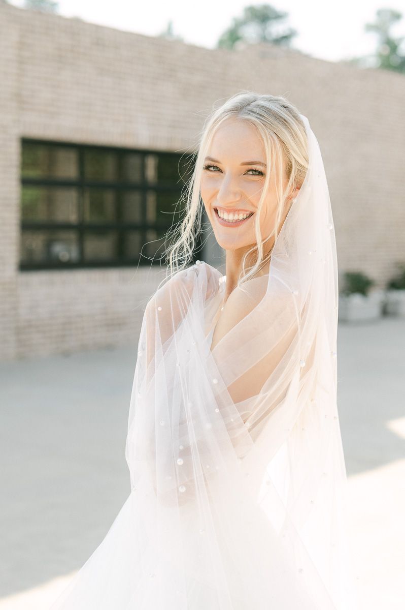 bride outside Iron Manor in Montgomery, Tx