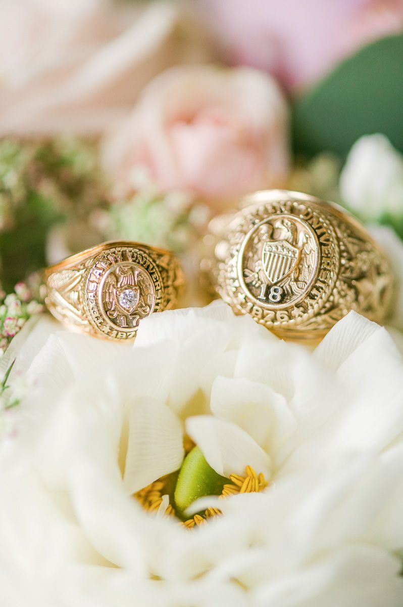 Aggie rings on white flower
