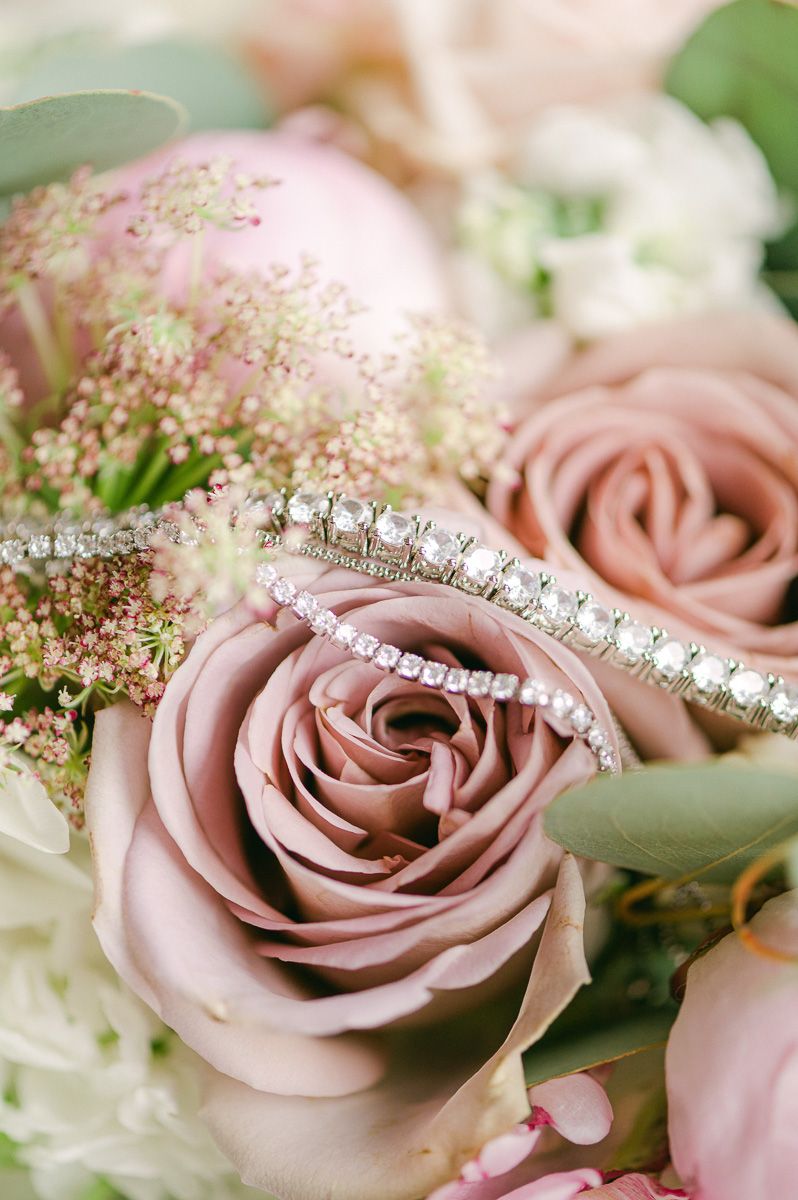 wedding bracelet on dusty pink flower