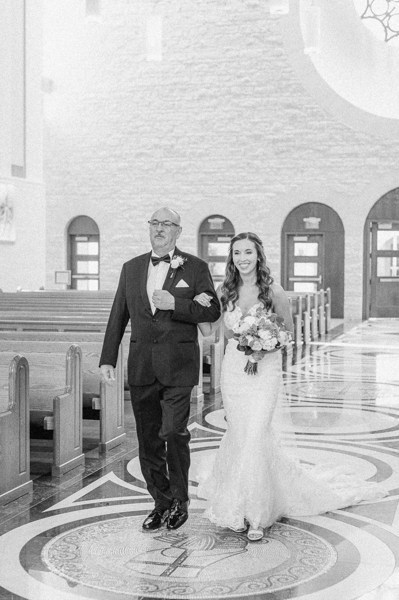 bride walking up the aisle on wedding day