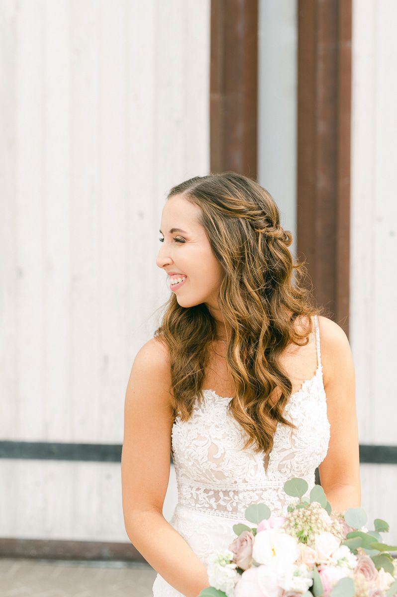 bride holding bouquet outside Beckendorff Farms in Katy, Tx