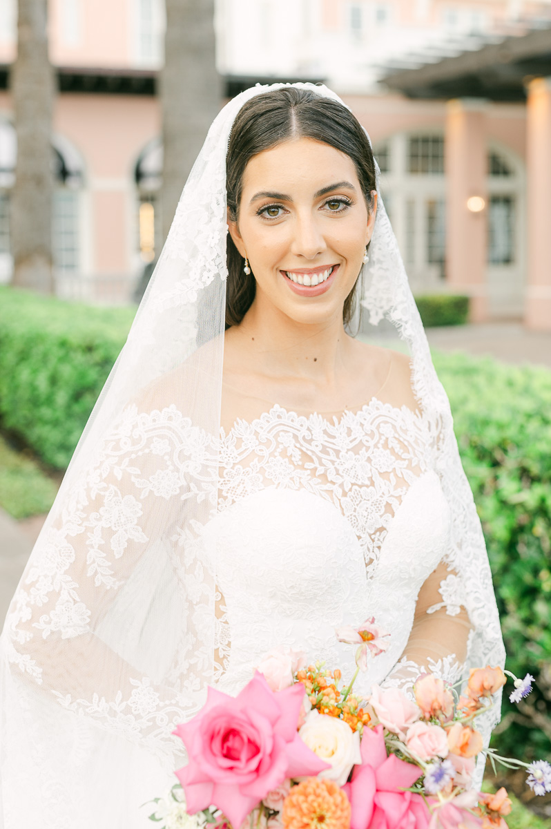 a bride wearing a classic wedding veil