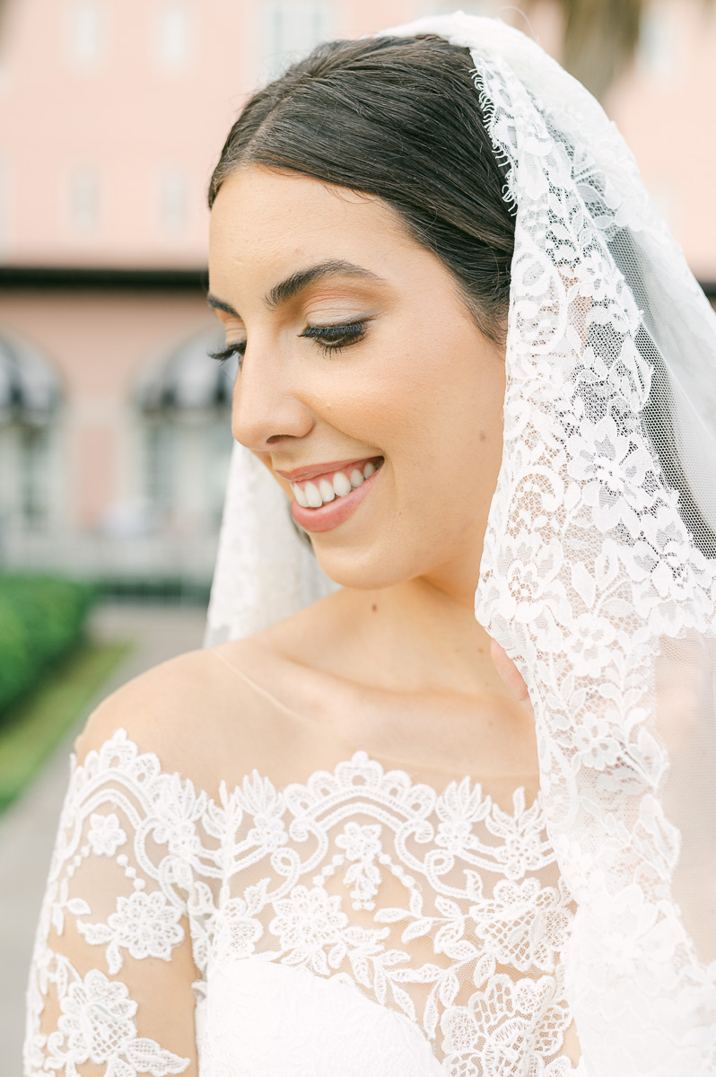 a bride wearing a classic wedding veil