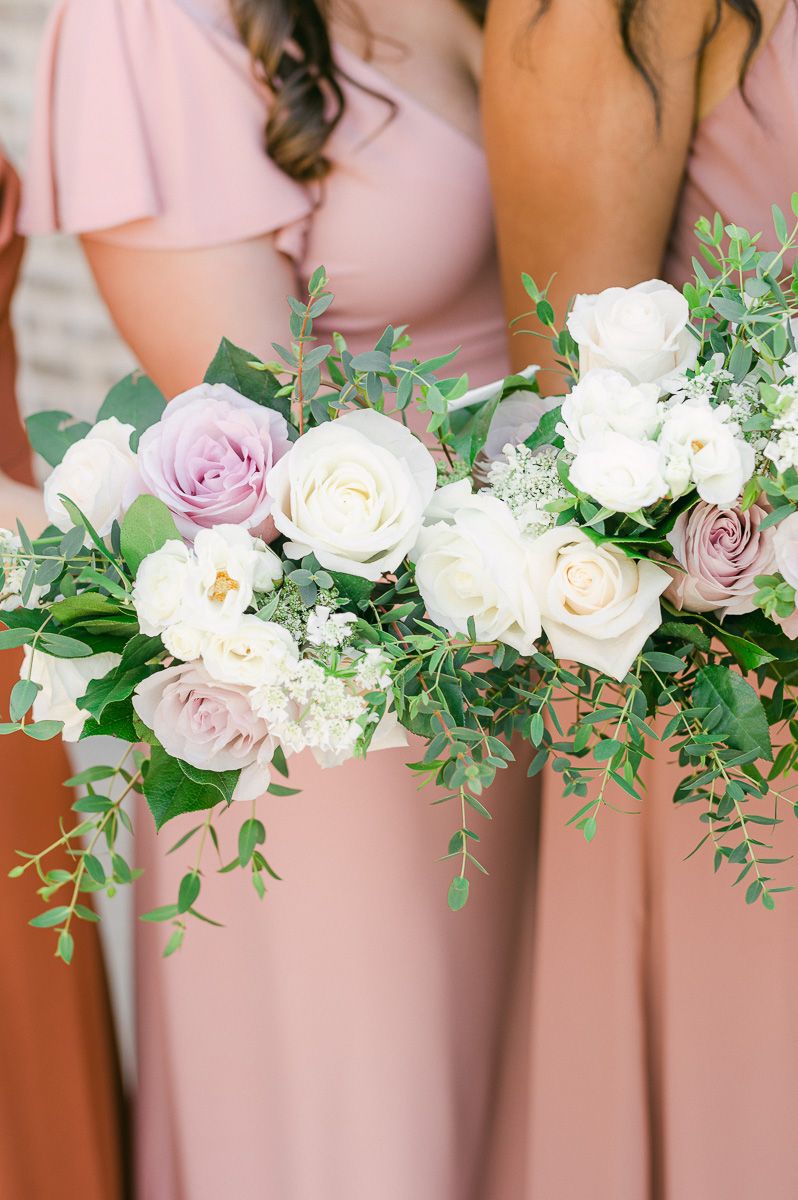 bridesmaids is different colored dresses at Montgomery, Tx wedding