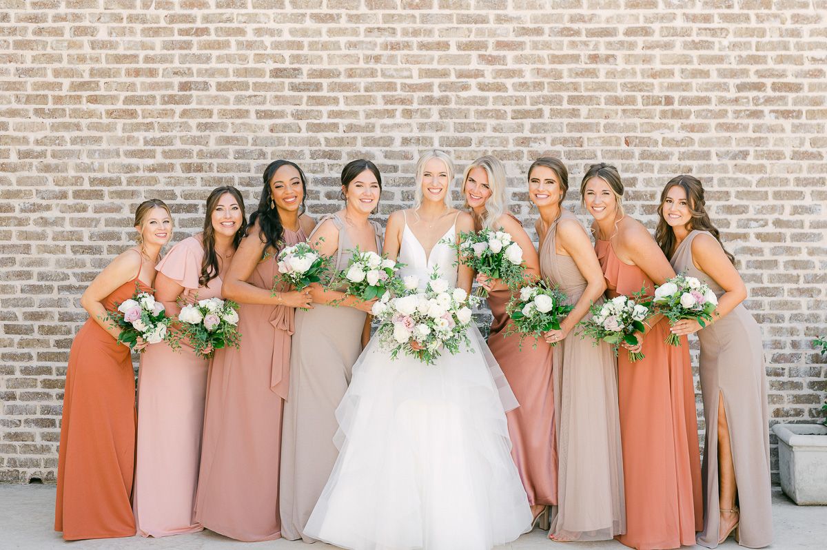 bridesmaids is different colored dresses at Montgomery, Tx wedding
