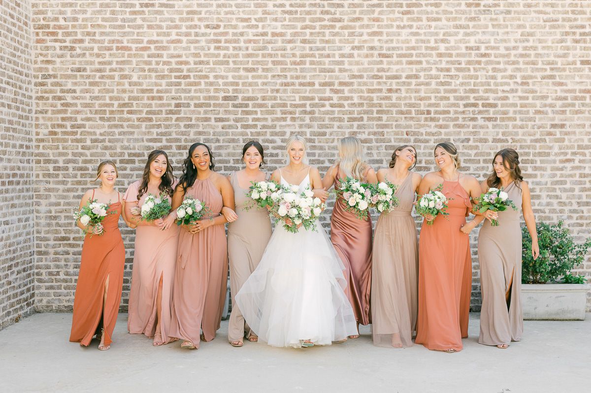 bridesmaids is different colored dresses at Montgomery, Tx wedding