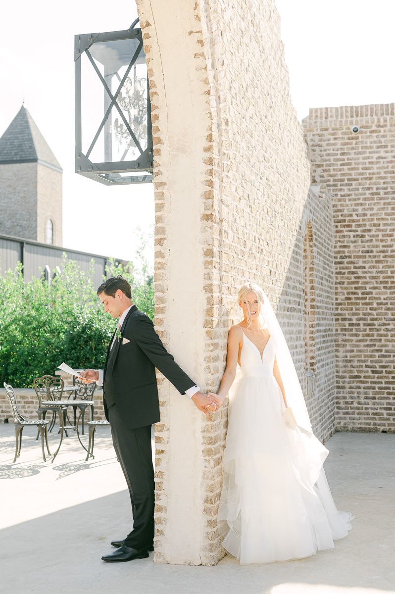 first touch between bride and groom at Iron Manor wedding venue