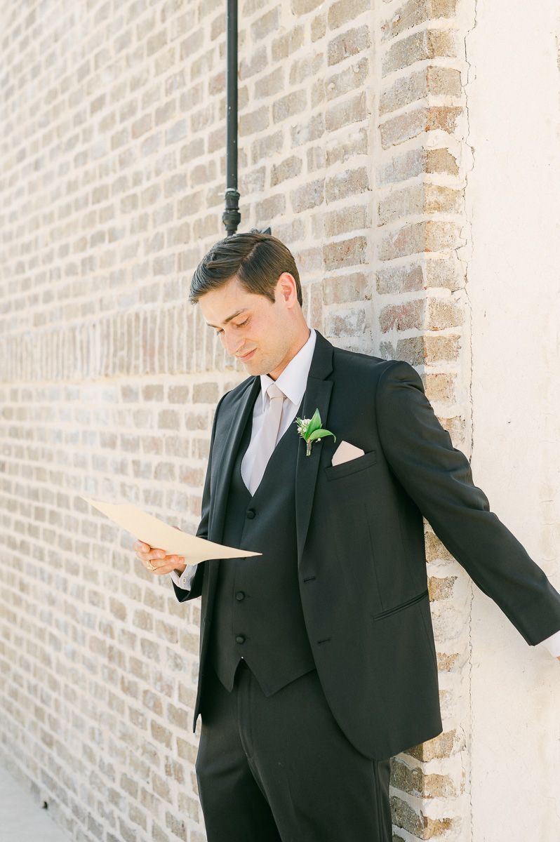first touch between bride and groom at Iron Manor wedding venue