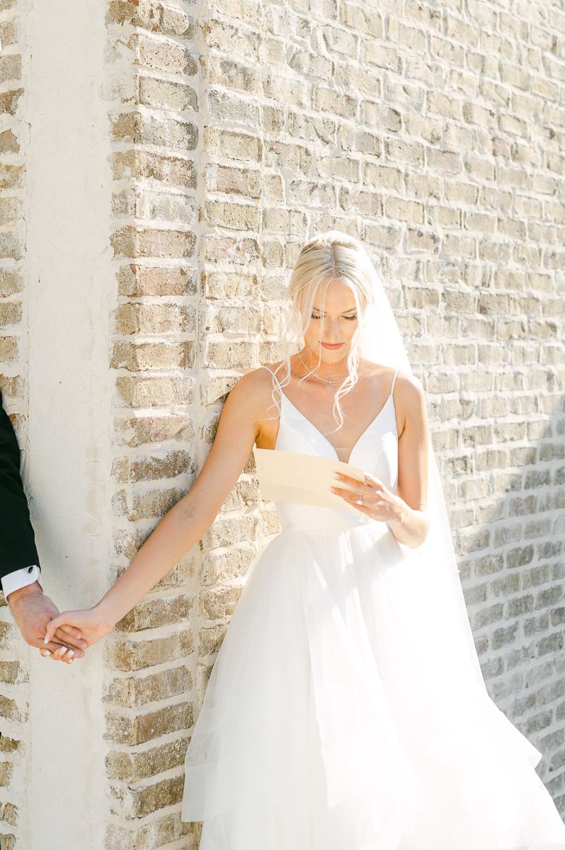 first touch between bride and groom at Iron Manor wedding venue