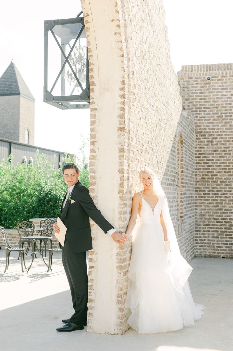 first touch between bride and groom at Iron Manor wedding venue