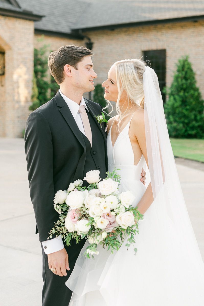 bride and groom outside Iron Manor wedding venue