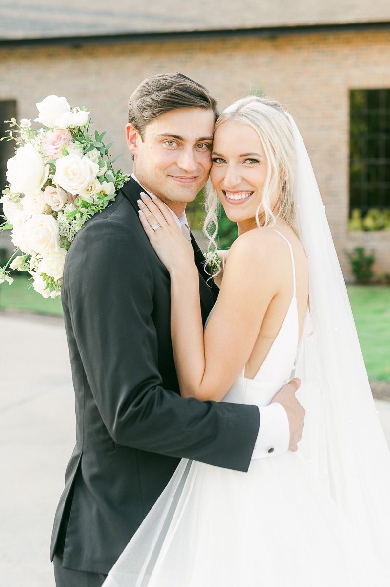 bride and groom outside Iron Manor wedding venue