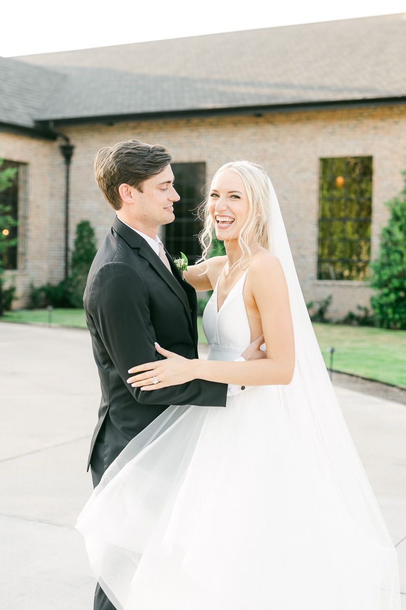 bride and groom outside Iron Manor wedding venue