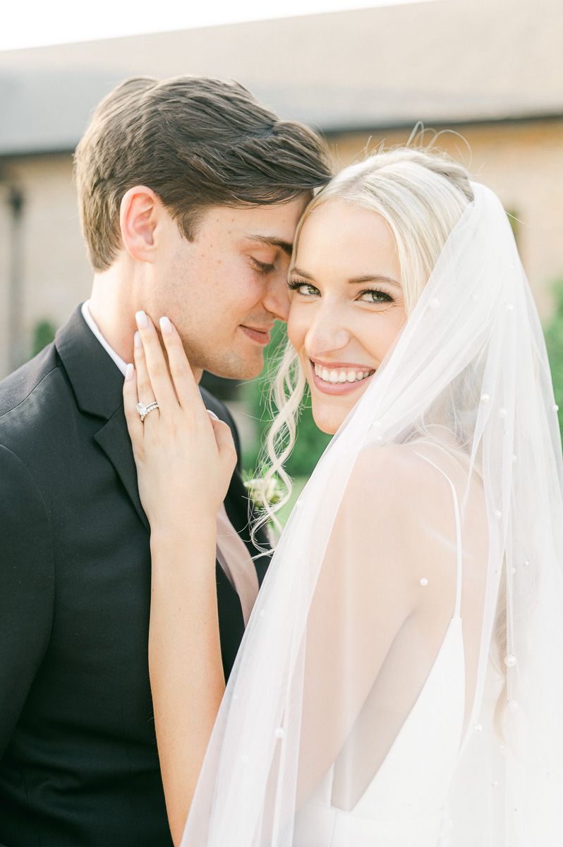 bride and groom outside Iron Manor wedding venue