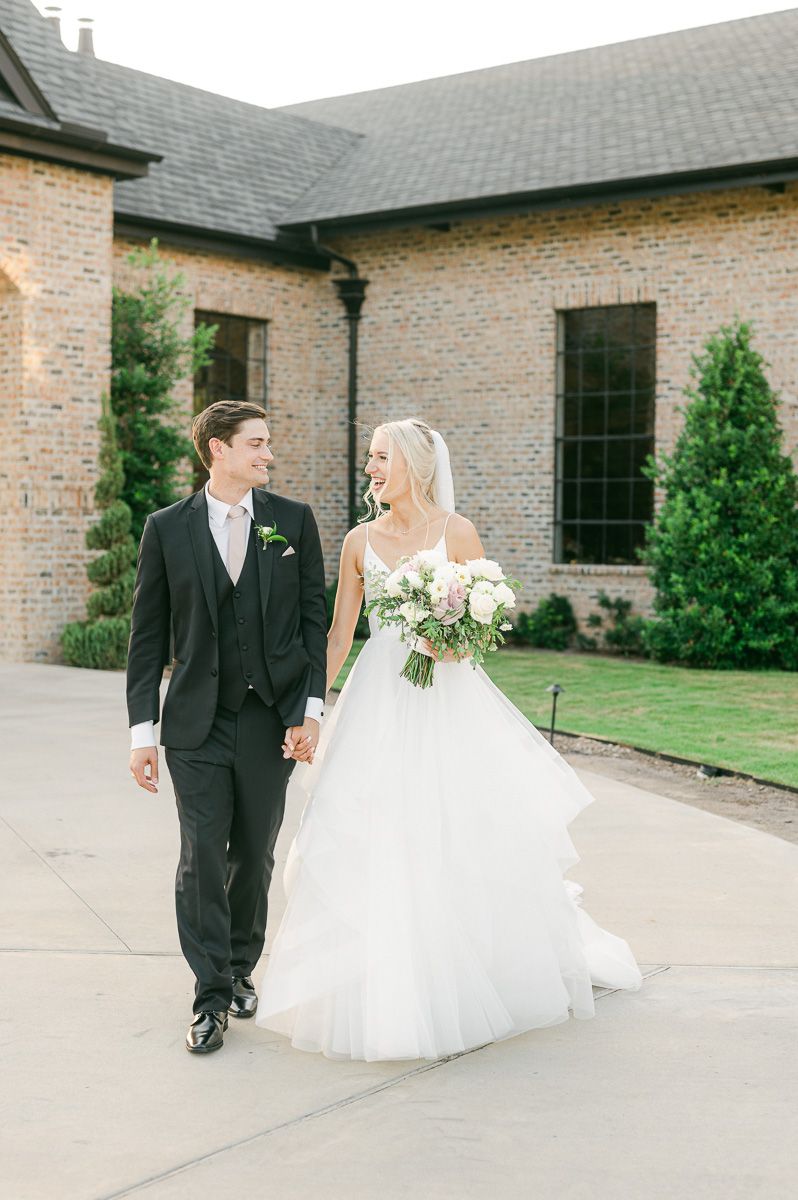 bride and groom outside Iron Manor wedding venue