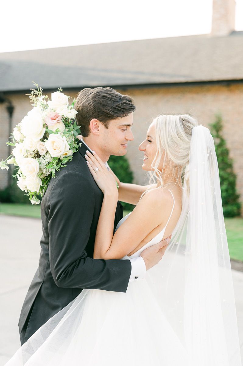bride and groom outside Iron Manor wedding venue
