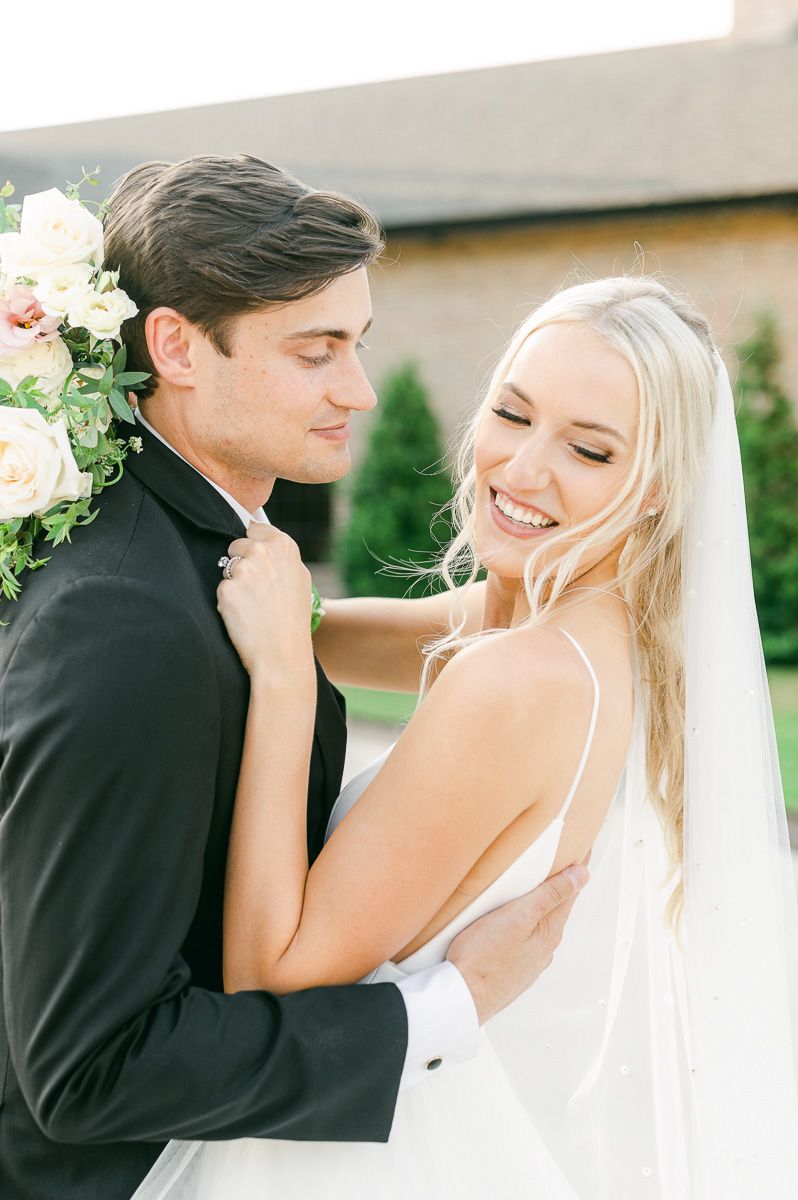 bride and groom outside Iron Manor wedding venue
