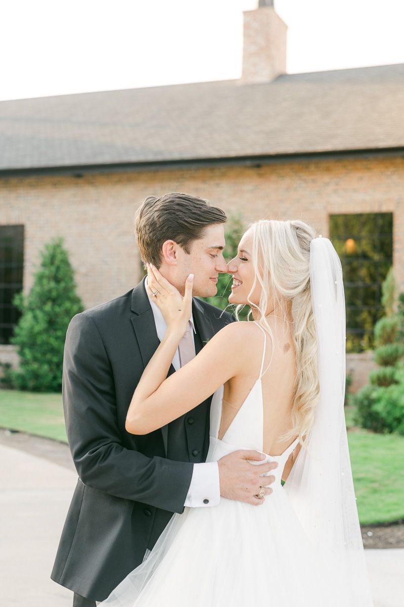 bride and groom outside Iron Manor wedding venue