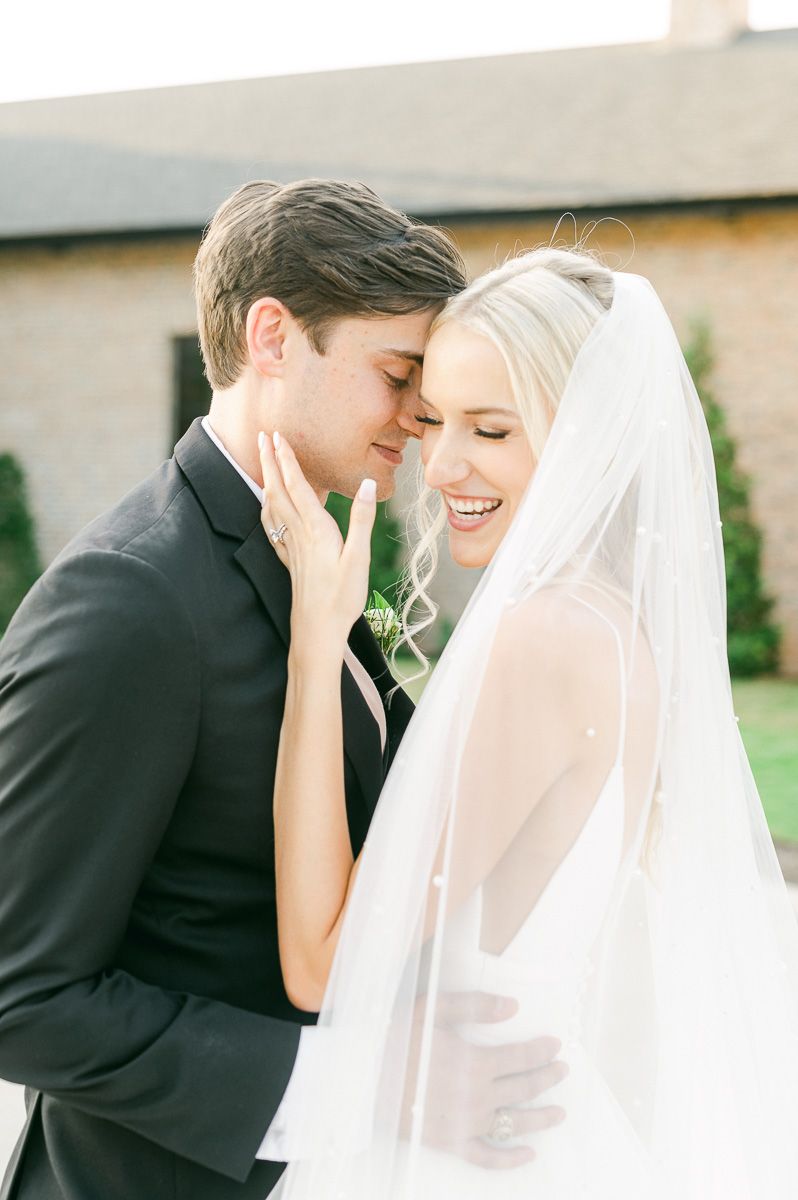 bride and groom outside Iron Manor wedding venue