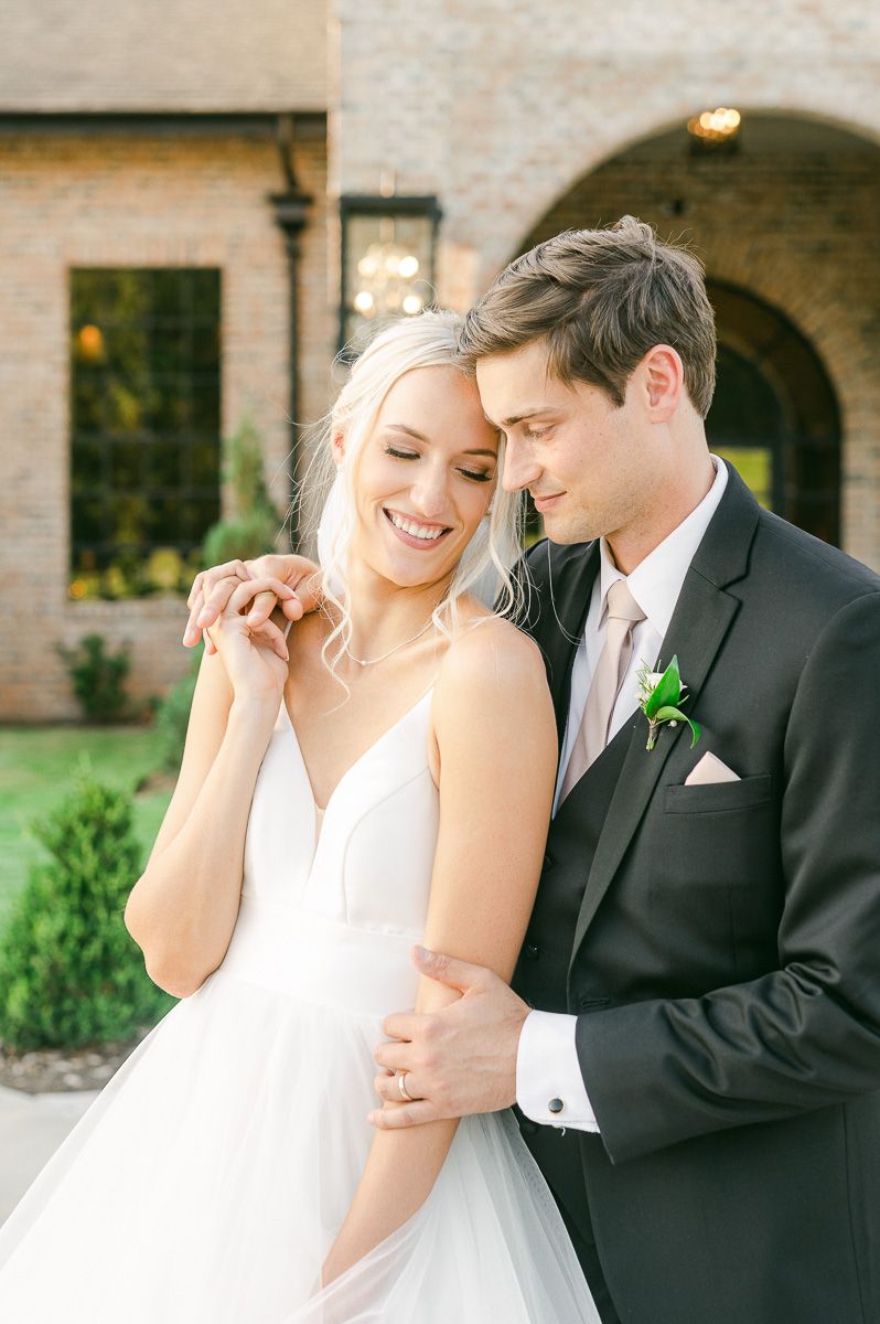 bride and groom outside Iron Manor wedding venue