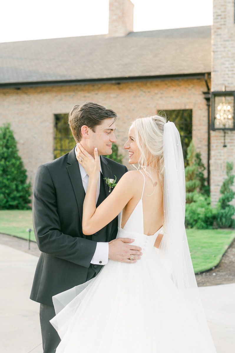bride and groom outside Iron Manor wedding venue