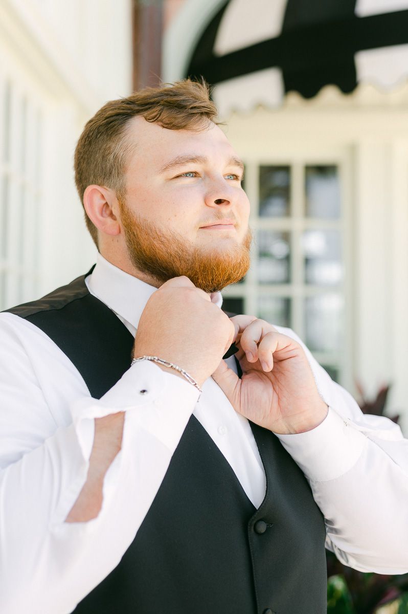 groom getting ready at Grand Galvez
