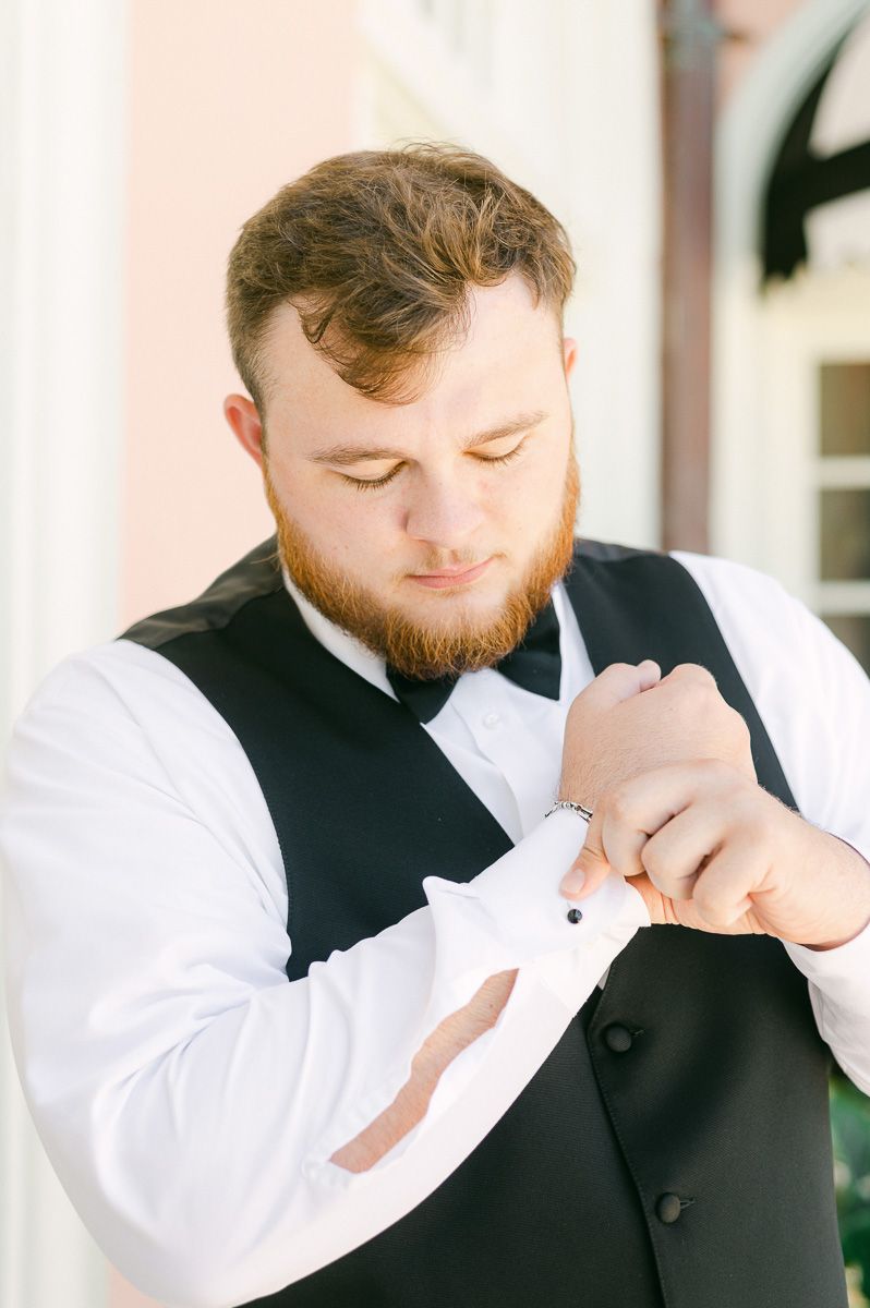 groom getting ready at Grand Galvez