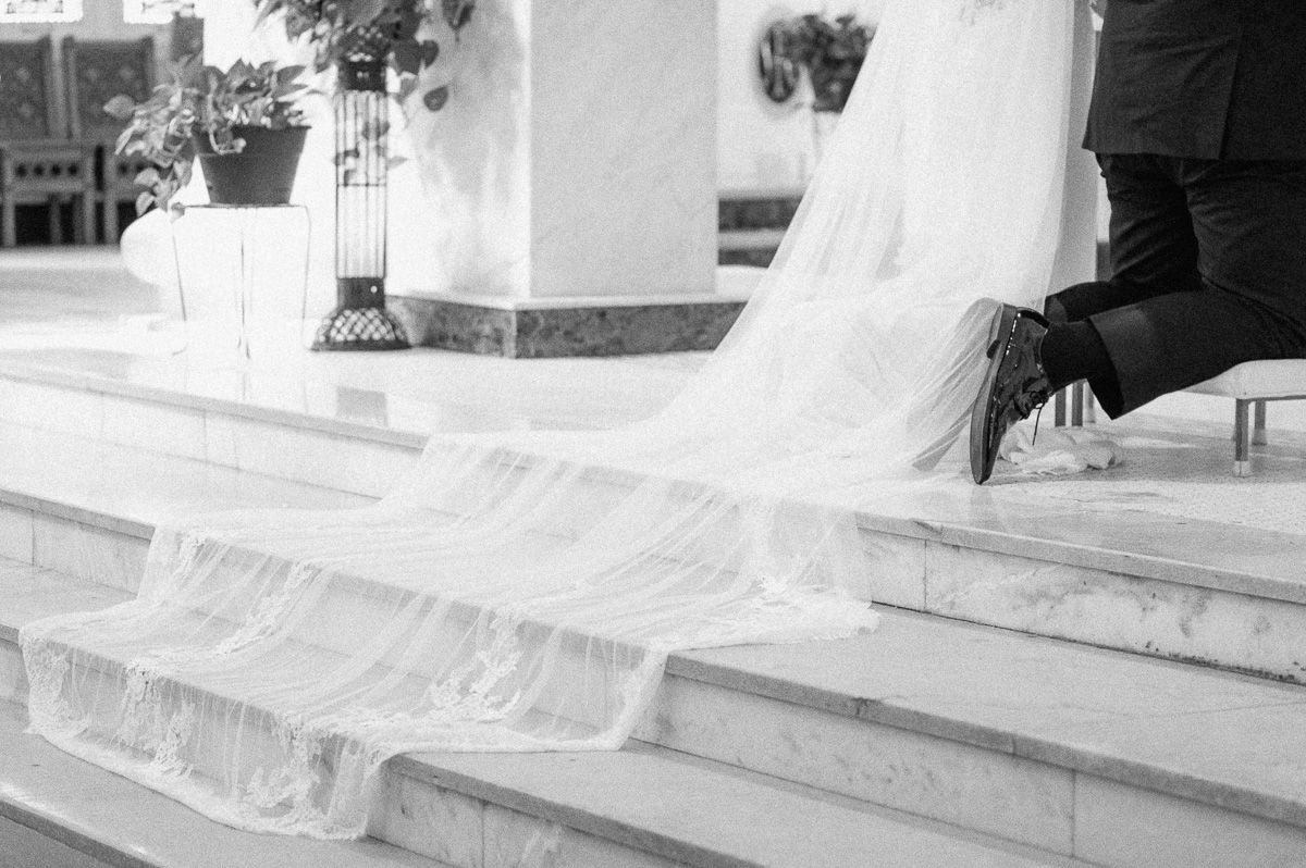 veil on floor during ceremony