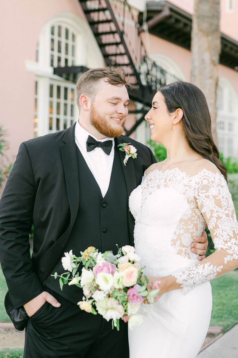 bride and groom outside Grand Galvez