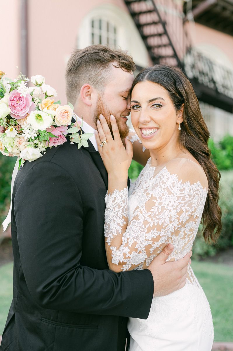 bride and groom outside Grand Galvez