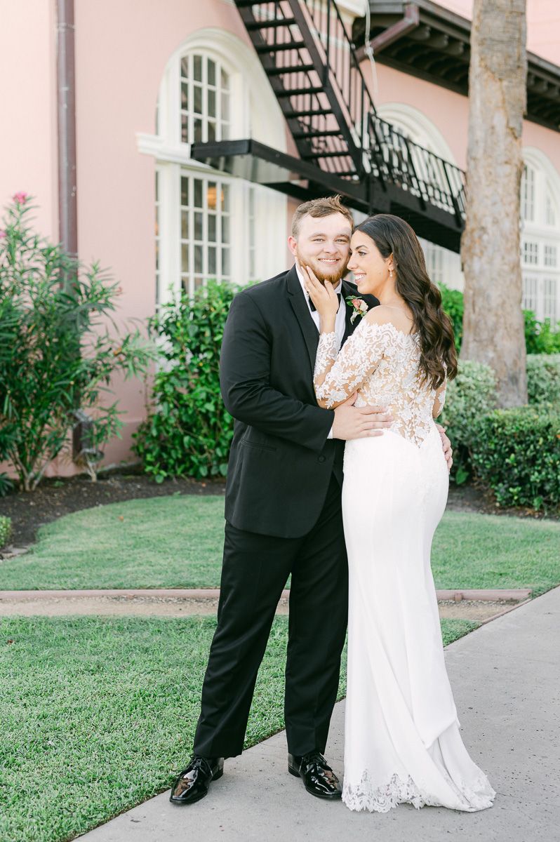 bride and groom outside Grand Galvez in Galveston