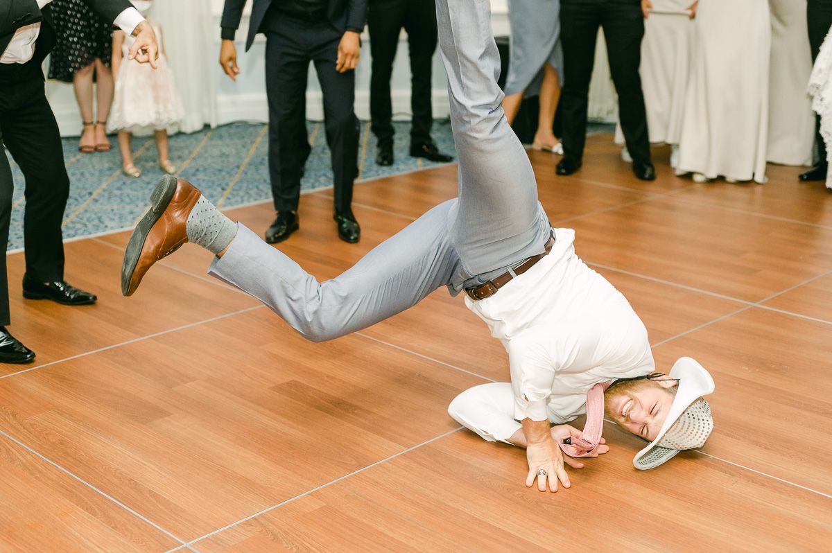 guests dancing at a wedding reception 