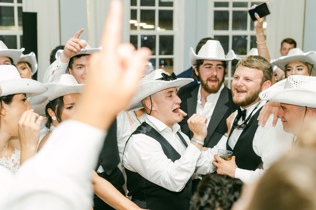 guests dancing at a wedding reception 