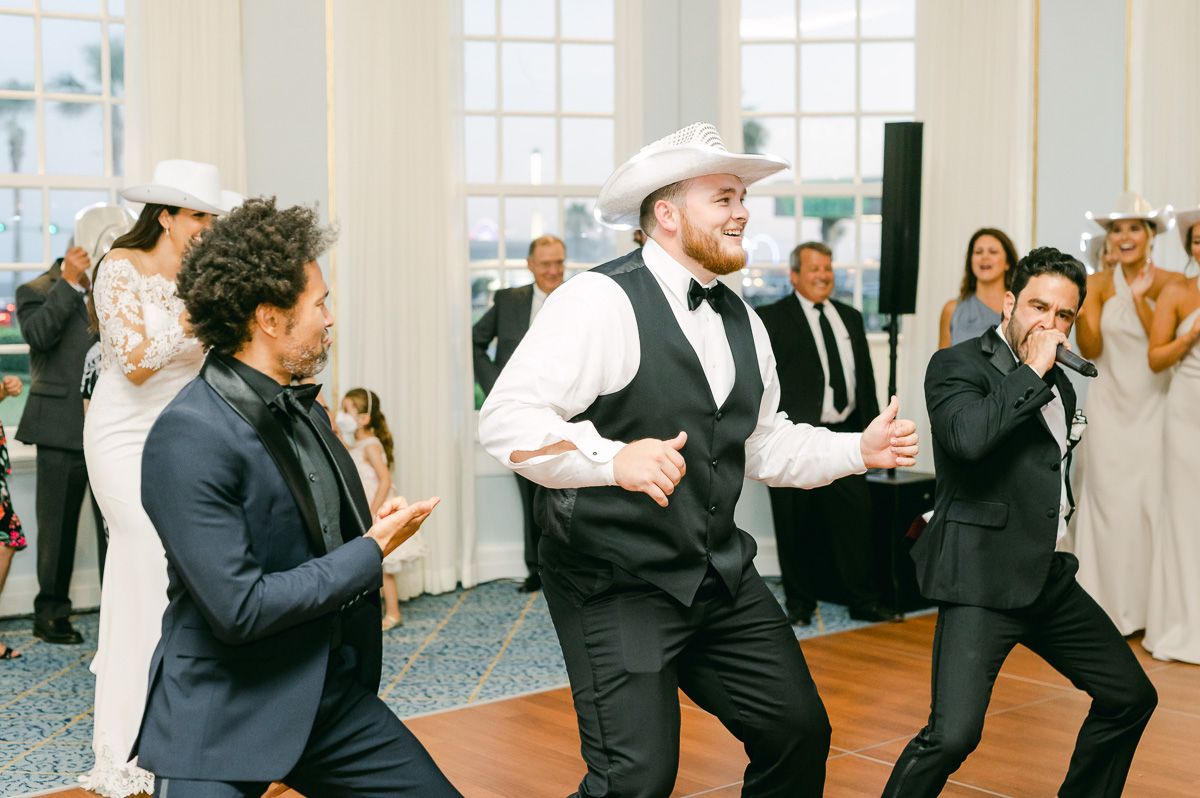 guests dancing at a wedding reception 