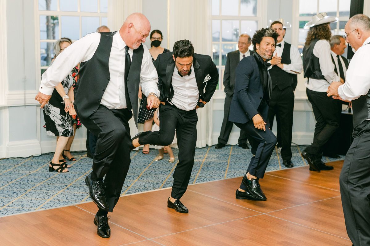 guests dancing at a wedding reception 