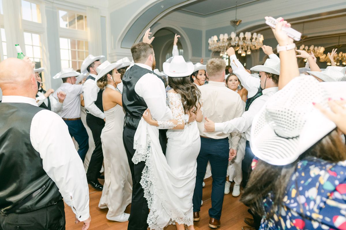 guests dancing at a wedding reception 