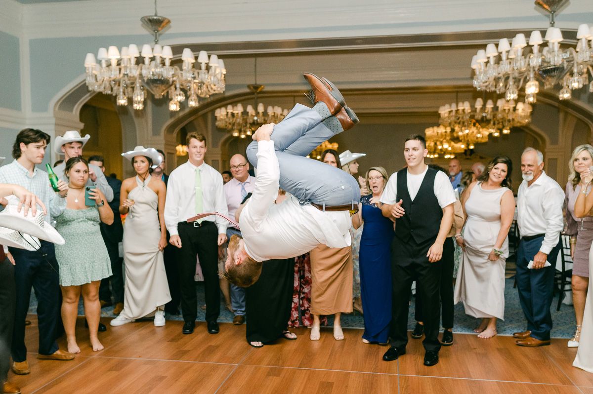 wedding guest doing a flip