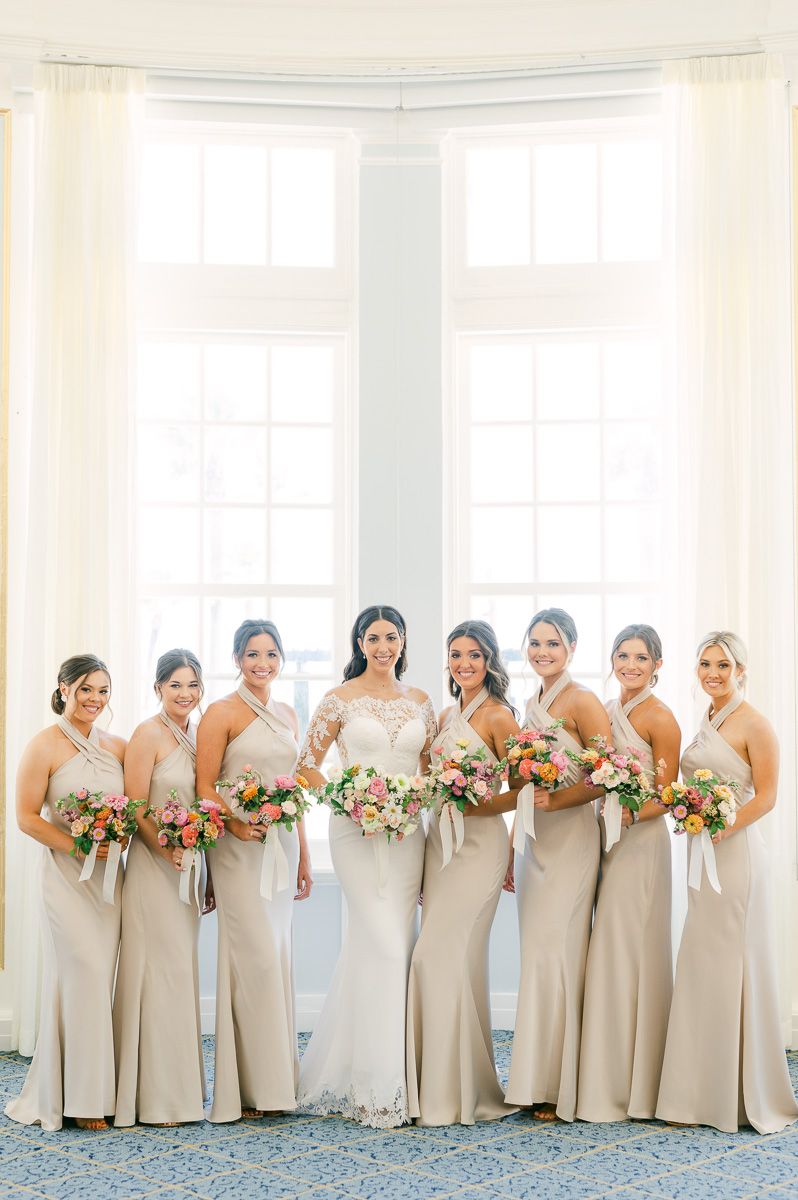 bridesmaids in champagne dresses in Galveston