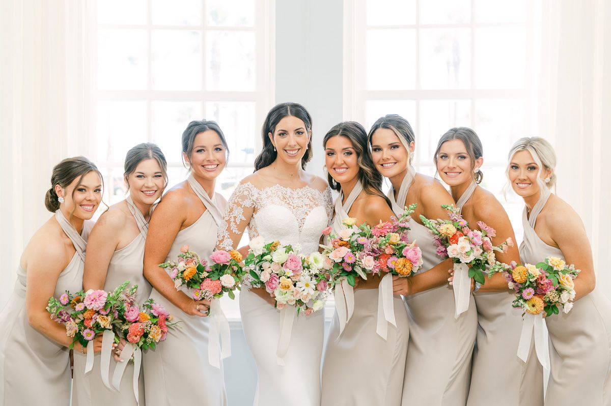 bridesmaids in champagne dresses in Galveston
